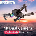 E88 Pro foldable drone with 4K dual camera flying above ocean at sunset, Tafeen Toys