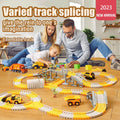 Family playing with Tafeen Toys varied track splicing construction set on wooden floor